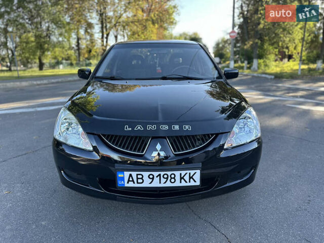 Мицубиси Лансер 2005 в Виннице на Automoto.ua Черный Мицубиси Лансер, объемом двигателя 1.6 л и пробегом 261 тыс. км за 4100 $, фото 26 на Automoto.ua