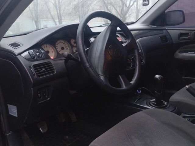 Чорний Міцубісі Lancer, об'ємом двигуна 1.6 л та пробігом 211 тис. км за 3700 $, фото 4 на Automoto.ua