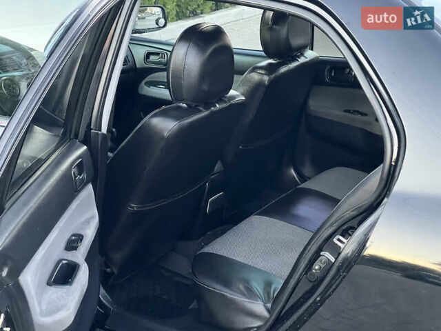 Мицубиси Лансер 2005 в Черкассах на Automoto.ua Черный Мицубиси Лансер, объемом двигателя 1.58 л и пробегом 368 тыс. км за 4400 $, фото 25 на Automoto.ua