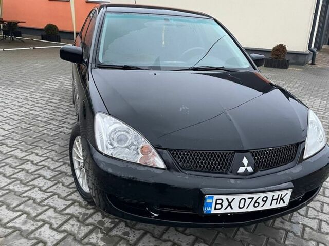 Черный Мицубиси Лансер, объемом двигателя 1.6 л и пробегом 240 тыс. км за 3499 $, фото 3 на Automoto.ua