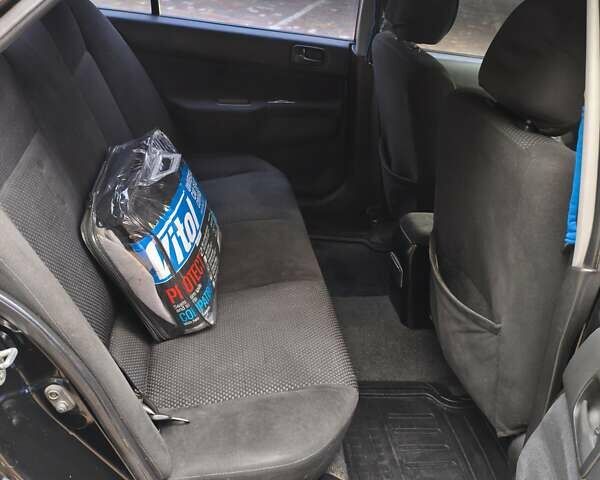 Мицубиси Лансер 2005 в Одессе на Automoto.ua Черный Мицубиси Лансер, объемом двигателя 1.58 л и пробегом 206 тыс. км за 3900 $, фото 11 на Automoto.ua