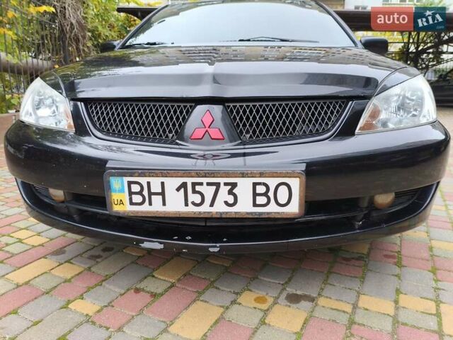 Мицубиси Лансер 2005 в Одессе на Automoto.ua Черный Мицубиси Лансер, объемом двигателя 1.58 л и пробегом 206 тыс. км за 3900 $, фото 9 на Automoto.ua