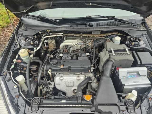 Черный Мицубиси Лансер, объемом двигателя 1.6 л и пробегом 280 тыс. км за 3200 $, фото 7 на Automoto.ua