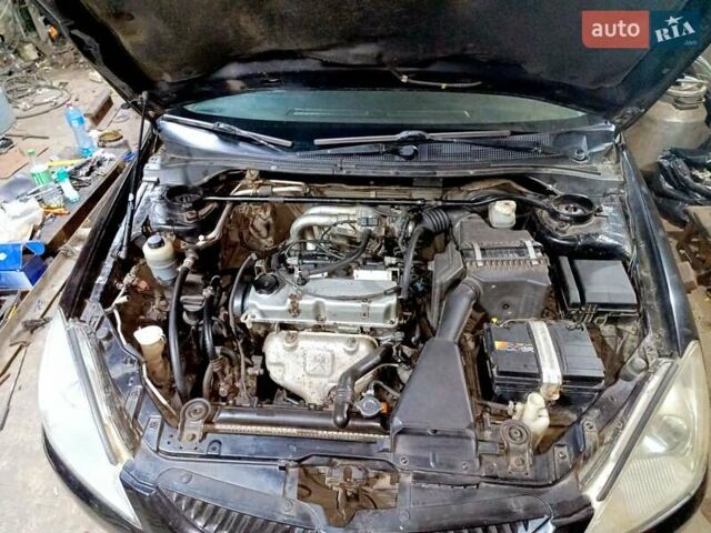 Чорний Міцубісі Lancer, об'ємом двигуна 1.58 л та пробігом 294 тис. км за 3800 $, фото 1 на Automoto.ua