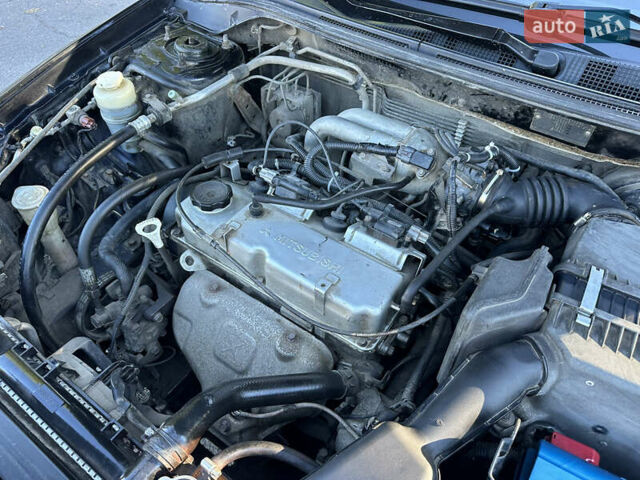 Мицубиси Лансер 2005 в Виннице на Automoto.ua Черный Мицубиси Лансер, объемом двигателя 1.6 л и пробегом 261 тыс. км за 4100 $, фото 57 на Automoto.ua