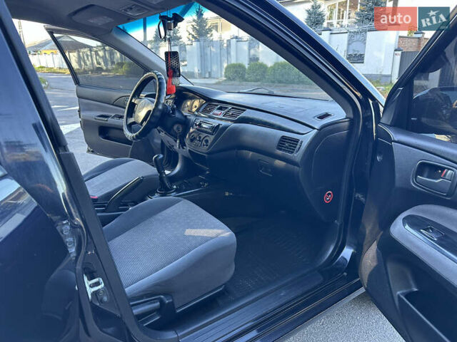 Мицубиси Лансер 2005 в Виннице на Automoto.ua Черный Мицубиси Лансер, объемом двигателя 1.6 л и пробегом 261 тыс. км за 4100 $, фото 50 на Automoto.ua