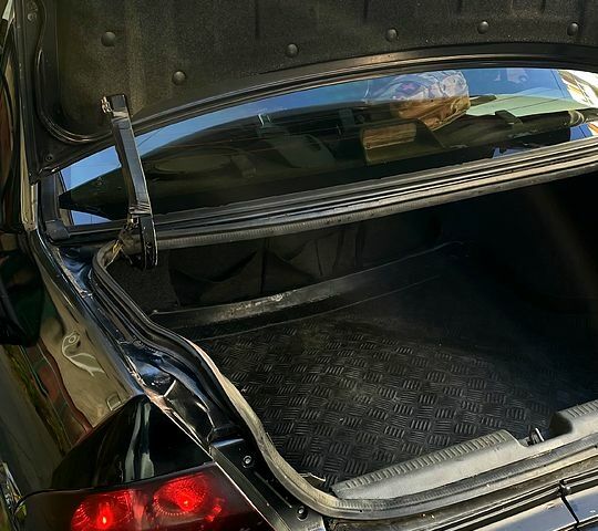 Черный Мицубиси Лансер, объемом двигателя 1.6 л и пробегом 200 тыс. км за 3000 $, фото 6 на Automoto.ua