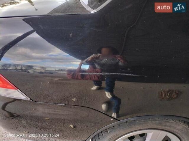 Міцубісі Lancer 2005 у Запоріжжя на Automoto.ua Чорний Міцубісі Lancer, об'ємом двигуна 1.58 л та пробігом 186 тис. км за 4700 $, фото 12 на Automoto.ua