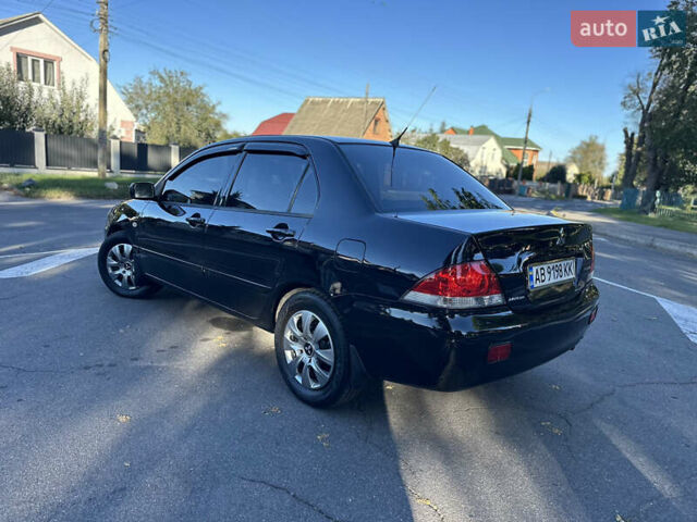 Мицубиси Лансер 2005 в Виннице на Automoto.ua Черный Мицубиси Лансер, объемом двигателя 1.6 л и пробегом 261 тыс. км за 4100 $, фото 24 на Automoto.ua