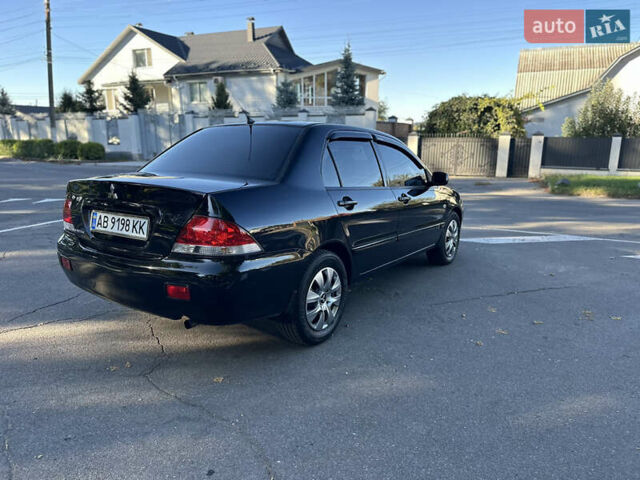 Мицубиси Лансер 2005 в Виннице на Automoto.ua Черный Мицубиси Лансер, объемом двигателя 1.6 л и пробегом 261 тыс. км за 4100 $, фото 30 на Automoto.ua