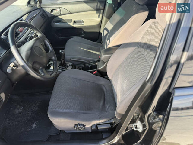 Чорний Міцубісі Lancer, об'ємом двигуна 1.6 л та пробігом 205 тис. км за 3650 $, фото 8 на Automoto.ua