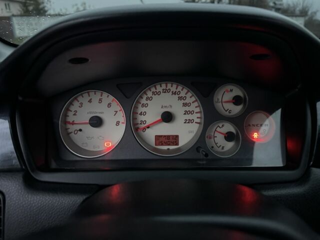 Чорний Міцубісі Lancer, об'ємом двигуна 1.6 л та пробігом 154 тис. км за 5500 $, фото 20 на Automoto.ua