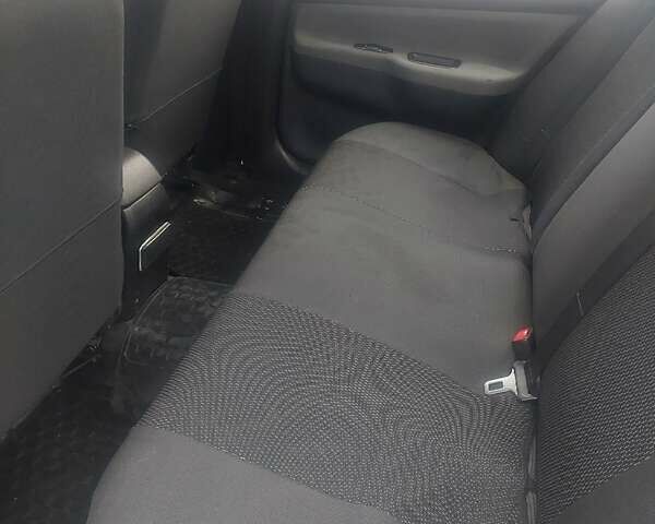 Чорний Міцубісі Lancer, об'ємом двигуна 1.58 л та пробігом 275 тис. км за 3100 $, фото 4 на Automoto.ua