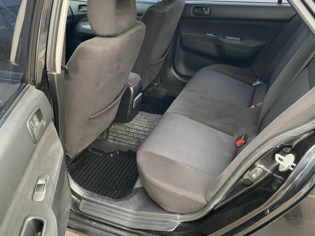 Черный Мицубиси Лансер, объемом двигателя 1.6 л и пробегом 350 тыс. км за 2900 $, фото 2 на Automoto.ua