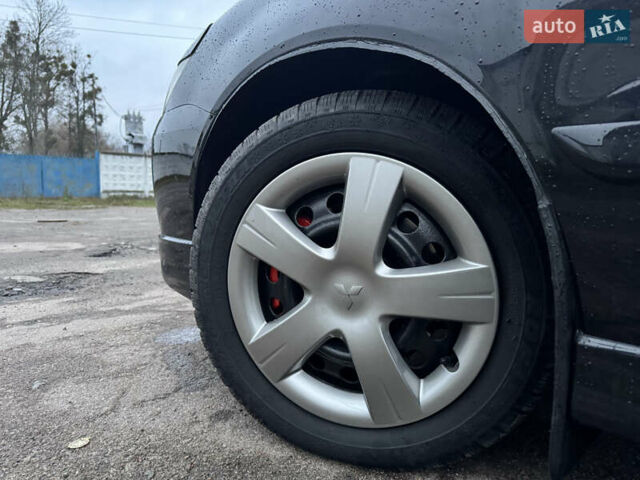 Черный Мицубиси Лансер, объемом двигателя 1.58 л и пробегом 154 тыс. км за 5500 $, фото 41 на Automoto.ua