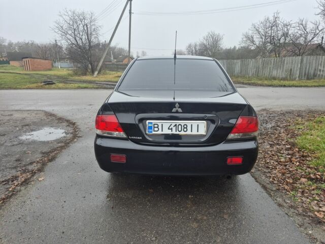 Черный Мицубиси Лансер, объемом двигателя 1.6 л и пробегом 280 тыс. км за 3200 $, фото 3 на Automoto.ua