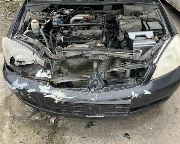 Черный Мицубиси Лансер, объемом двигателя 1.58 л и пробегом 360 тыс. км за 1500 $, фото 7 на Automoto.ua