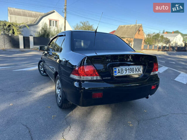 Мицубиси Лансер 2005 в Виннице на Automoto.ua Черный Мицубиси Лансер, объемом двигателя 1.6 л и пробегом 261 тыс. км за 4100 $, фото 23 на Automoto.ua