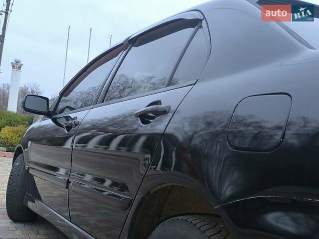 Чорний Міцубісі Lancer, об'ємом двигуна 1.58 л та пробігом 263 тис. км за 4500 $, фото 13 на Automoto.ua