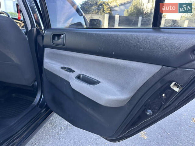 Мицубиси Лансер 2005 в Виннице на Automoto.ua Черный Мицубиси Лансер, объемом двигателя 1.6 л и пробегом 261 тыс. км за 4100 $, фото 47 на Automoto.ua