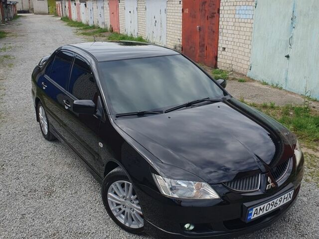 Чорний Міцубісі Lancer, об'ємом двигуна 1.6 л та пробігом 154 тис. км за 5500 $, фото 23 на Automoto.ua