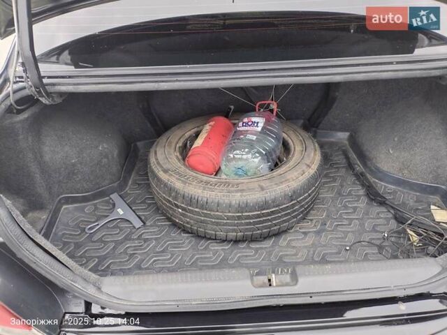 Міцубісі Lancer 2005 у Запоріжжя на Automoto.ua Чорний Міцубісі Lancer, об'ємом двигуна 1.58 л та пробігом 186 тис. км за 4700 $, фото 9 на Automoto.ua