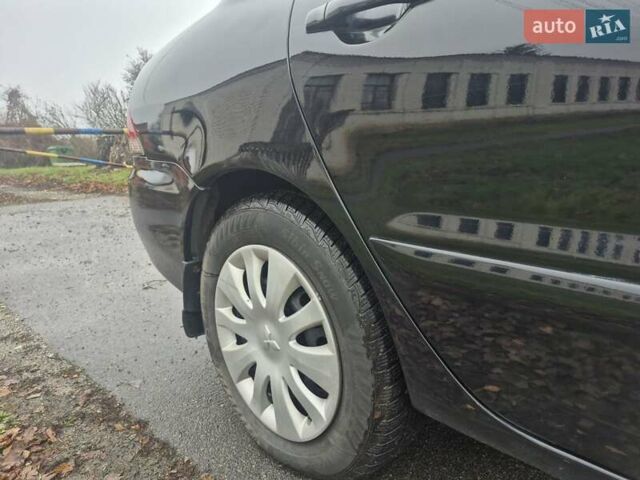 Черный Мицубиси Лансер, объемом двигателя 1.58 л и пробегом 280 тыс. км за 3200 $, фото 6 на Automoto.ua