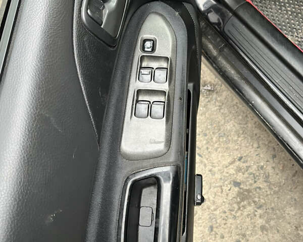 Черный Мицубиси Лансер, объемом двигателя 1.58 л и пробегом 360 тыс. км за 1500 $, фото 11 на Automoto.ua