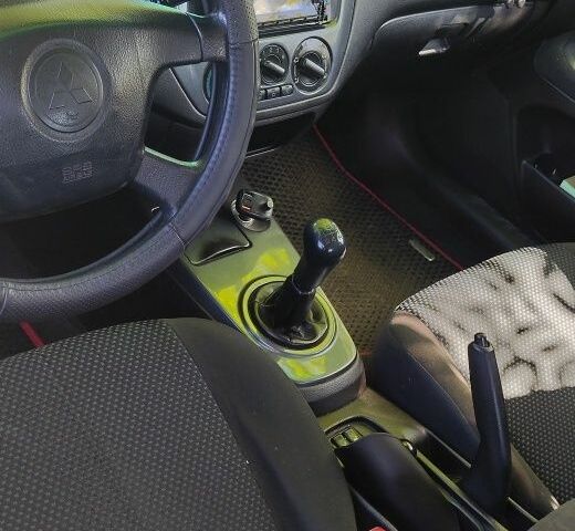 Мицубиси Лансер 2005 в Южноукраинске на Automoto.ua Черный Мицубиси Лансер, объемом двигателя 1.6 л и пробегом 350 тыс. км за 3099 $, фото 2 на Automoto.ua