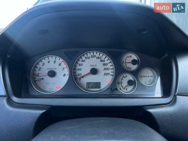 Черный Мицубиси Лансер, объемом двигателя 1.58 л и пробегом 310 тыс. км за 5690 $, фото 19 на Automoto.ua