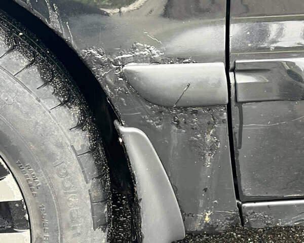 Чорний Міцубісі Lancer, об'ємом двигуна 1.58 л та пробігом 390 тис. км за 4500 $, фото 16 на Automoto.ua