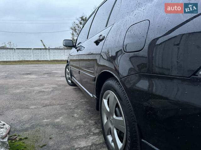 Черный Мицубиси Лансер, объемом двигателя 1.58 л и пробегом 154 тыс. км за 5500 $, фото 14 на Automoto.ua