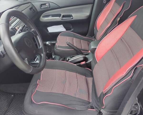 Міцубісі Lancer 2005 у Запоріжжя на Automoto.ua Чорний Міцубісі Lancer, об'ємом двигуна 1.58 л та пробігом 186 тис. км за 4700 $, фото 4 на Automoto.ua