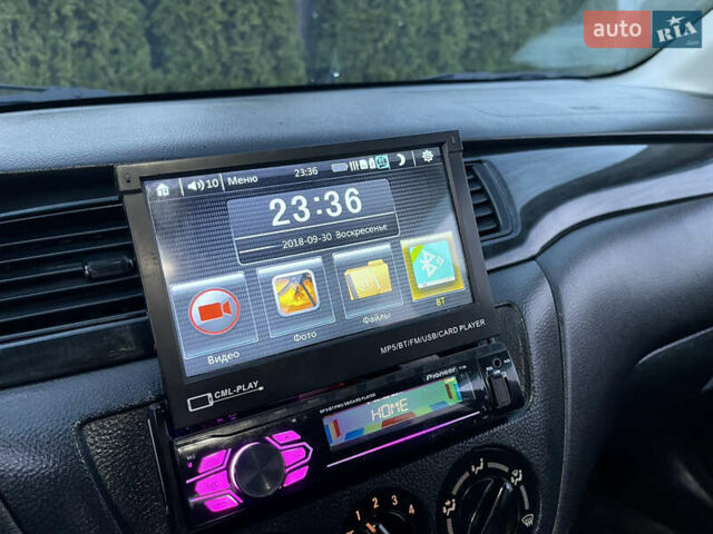 Мицубиси Лансер 2005 в Черкассах на Automoto.ua Черный Мицубиси Лансер, объемом двигателя 1.58 л и пробегом 368 тыс. км за 4400 $, фото 38 на Automoto.ua