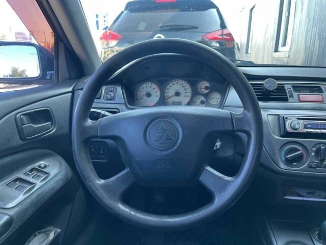 Чорний Міцубісі Lancer, об'ємом двигуна 2 л та пробігом 310 тис. км за 4990 $, фото 14 на Automoto.ua