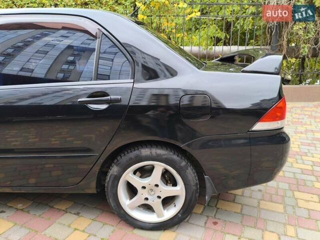 Мицубиси Лансер 2005 в Одессе на Automoto.ua Черный Мицубиси Лансер, объемом двигателя 1.58 л и пробегом 206 тыс. км за 3900 $, фото 3 на Automoto.ua