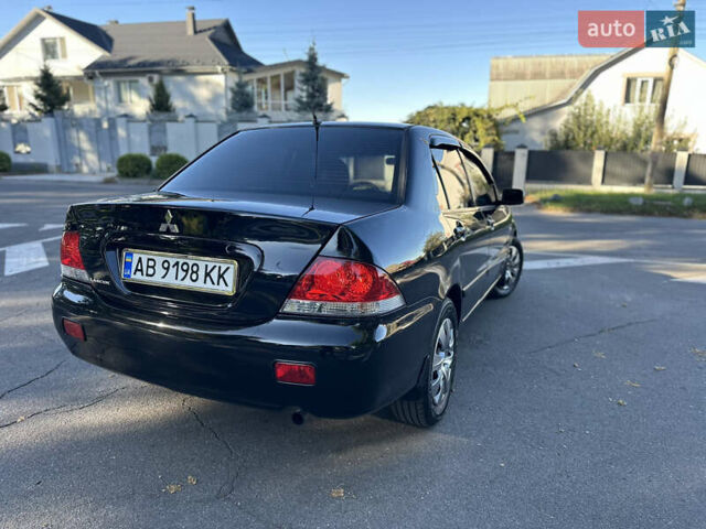 Мицубиси Лансер 2005 в Виннице на Automoto.ua Черный Мицубиси Лансер, объемом двигателя 1.6 л и пробегом 261 тыс. км за 4100 $, фото 14 на Automoto.ua