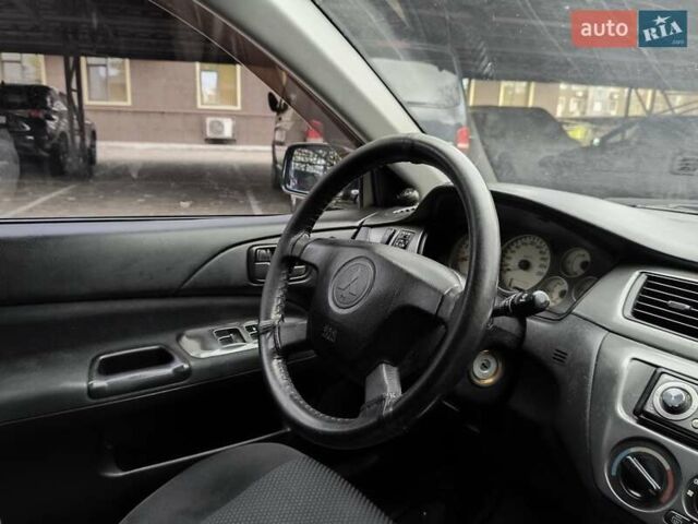 Мицубиси Лансер 2005 в Одессе на Automoto.ua Черный Мицубиси Лансер, объемом двигателя 1.58 л и пробегом 206 тыс. км за 3900 $, фото 19 на Automoto.ua