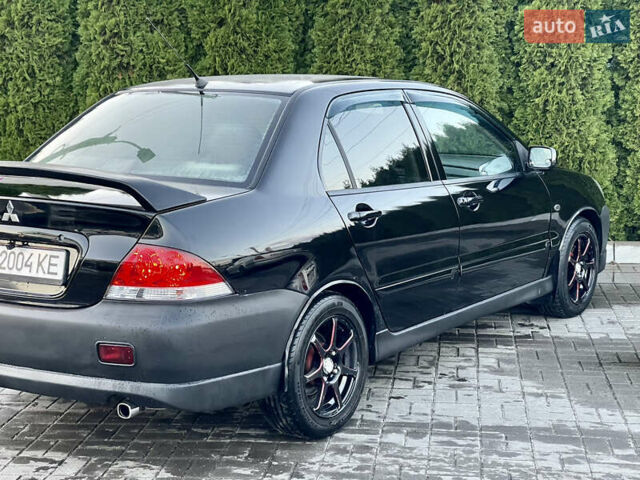 Мицубиси Лансер 2005 в Черкассах на Automoto.ua Черный Мицубиси Лансер, объемом двигателя 1.58 л и пробегом 368 тыс. км за 4400 $, фото 14 на Automoto.ua