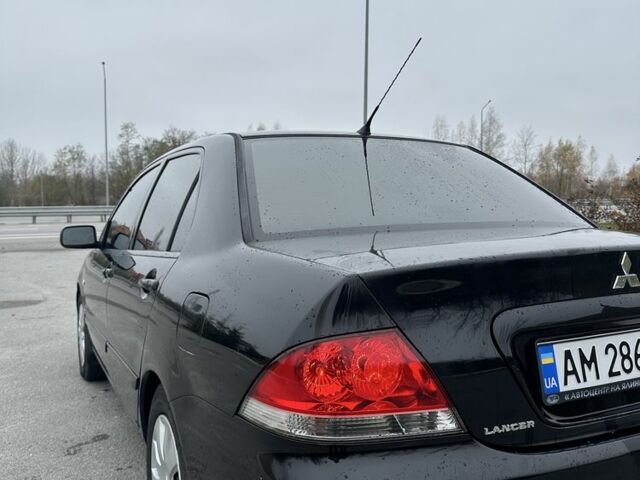 Черный Мицубиси Лансер, объемом двигателя 1.6 л и пробегом 200 тыс. км за 3500 $, фото 3 на Automoto.ua