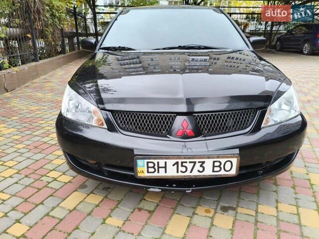 Мицубиси Лансер 2005 в Одессе на Automoto.ua Черный Мицубиси Лансер, объемом двигателя 1.58 л и пробегом 206 тыс. км за 3900 $, фото 8 на Automoto.ua