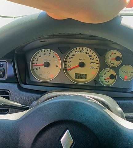 Черный Мицубиси Лансер, объемом двигателя 1.6 л и пробегом 238 тыс. км за 4300 $, фото 6 на Automoto.ua