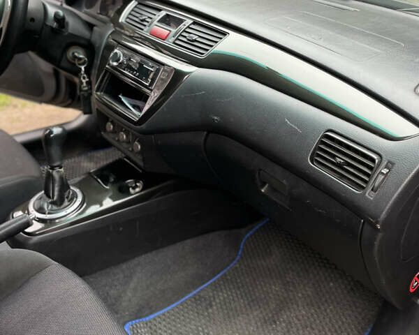 Чорний Міцубісі Lancer, об'ємом двигуна 2 л та пробігом 242 тис. км за 5900 $, фото 17 на Automoto.ua