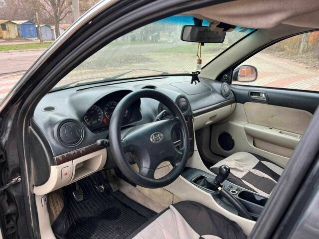 Черный Мицубиси Лансер, объемом двигателя 1.6 л и пробегом 250 тыс. км за 1300 $, фото 6 на Automoto.ua