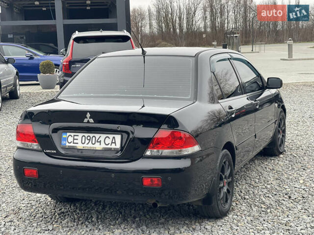 Чорний Міцубісі Lancer, об'ємом двигуна 1.58 л та пробігом 230 тис. км за 3350 $, фото 8 на Automoto.ua