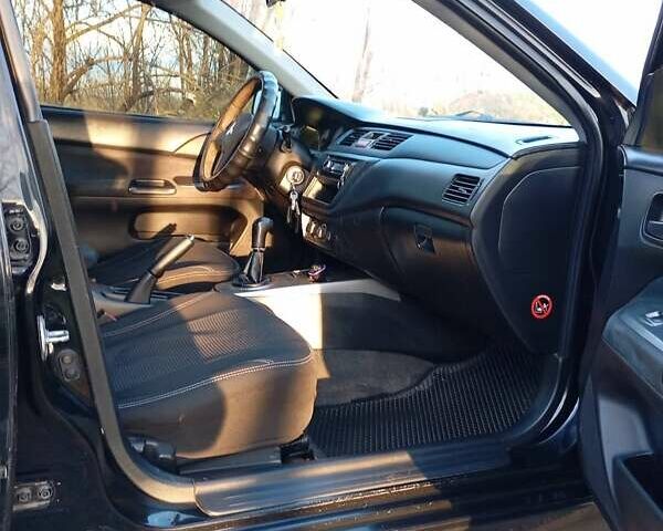 Чорний Міцубісі Lancer, об'ємом двигуна 1.6 л та пробігом 325 тис. км за 4750 $, фото 5 на Automoto.ua