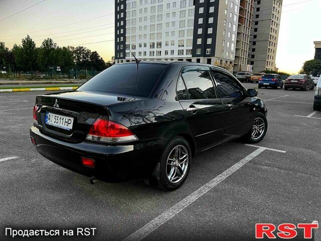 Чорний Міцубісі Lancer, об'ємом двигуна 1.6 л та пробігом 329 тис. км за 3500 $, фото 2 на Automoto.ua