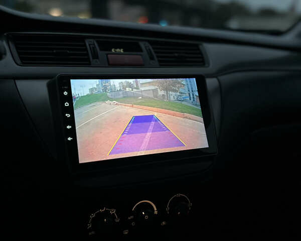 Чорний Міцубісі Lancer, об'ємом двигуна 1.58 л та пробігом 230 тис. км за 4350 $, фото 20 на Automoto.ua