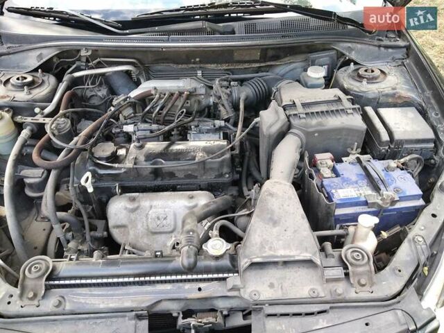 Чорний Міцубісі Lancer, об'ємом двигуна 1.58 л та пробігом 520 тис. км за 3400 $, фото 14 на Automoto.ua