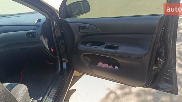 Чорний Міцубісі Lancer, об'ємом двигуна 1.6 л та пробігом 240 тис. км за 3900 $, фото 9 на Automoto.ua